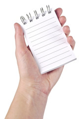 Obraz premium hand holding open empty lined pad - white background