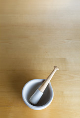Pestle and Mortar on Wood