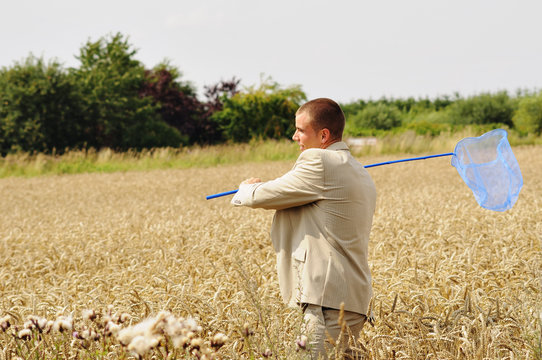 Student or environmental scientist collecting insects