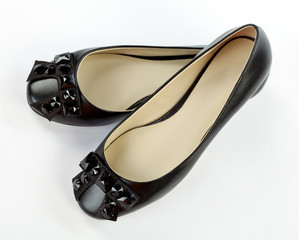 Pair of black flat shoes © zest_marina