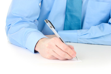 Businessman writing on document