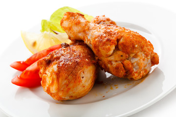 Roasted chicken drumsticks and vegetables