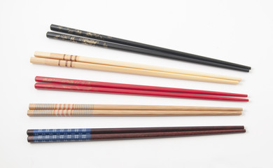 Fototapeta premium Five pairs of chinese sticks for eating chinese food