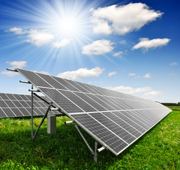 Solar energy panels against sunny sky