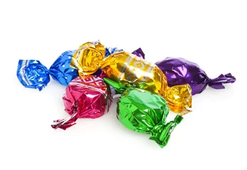 Abwaschbare Fototapete Bonbons in bunten Verpackungen © eyewave