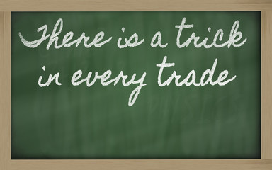 Obraz premium expression - There is a trick in every trade - written on a sch