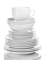 Clean plates and cups isolated on white