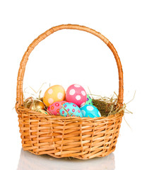 Colorful Easter eggs in the basket  isolated on white