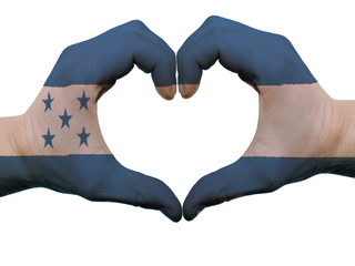 Heart and love gesture in honduras flag colors by hands isolated
