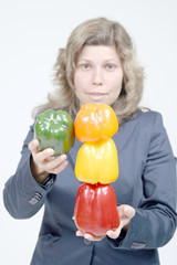 Fototapeta premium woman with colored peppers, healthy food photo