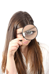 Young businesswoman holding Magnifying Glass, business photo