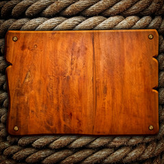 wooden board with rope