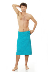 Fototapeta premium Handsome young man with the towel.