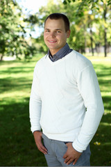 Young man in summer park