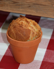 A Loaf of Bread Baked and Served in a Flower Pot.