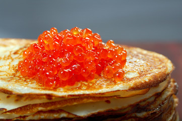 Russian pancakes  with red caviar