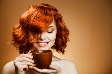 Stylish woman with an aromatic coffee in hands