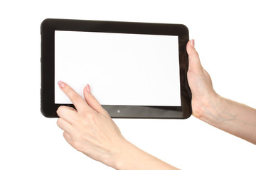 Obraz na płótnie Canvas woman hands holding a tablet isolated on white