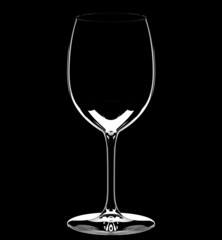 single empty wine glass on black background