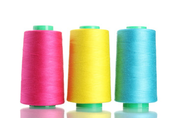 Bobbins of thread isolated on white