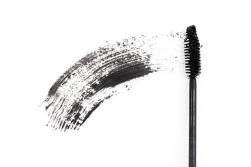 Black mascara brush stroke isolated on white