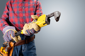 Plumber holding pipe wrench