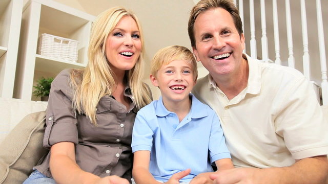 Young Caucasian Family Using Online Webchat
