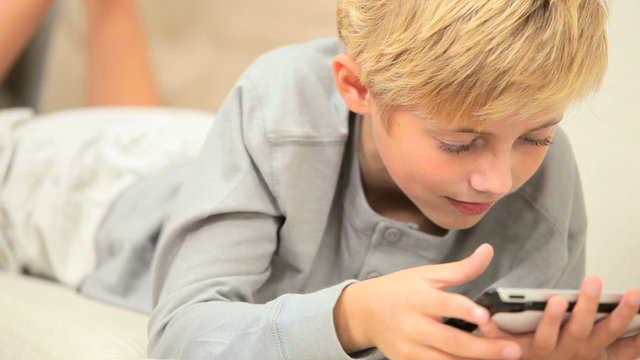 Caucasian Child with Modern Wireless Tablet