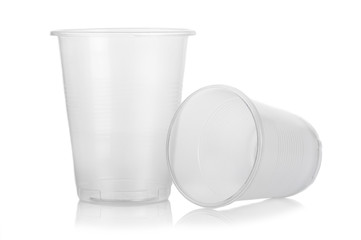 Two empty disposable plastic glass isolated on white background