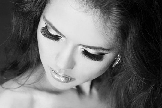 Beautiful Woman with long eyelashes,  black and white photo