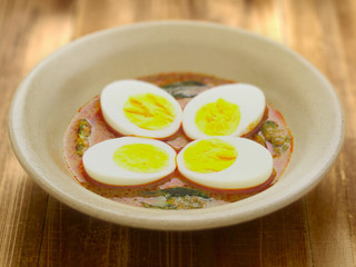 close up of a bowl of indian egg curry