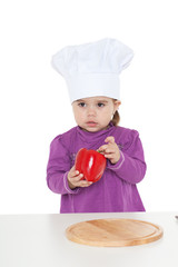 little girl in a lilac dress with the big saucepan