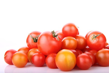 Cherry tomatoes on white background