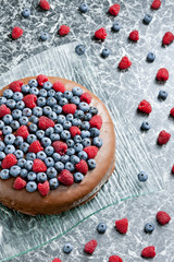 chocolate cake with raspberries and blueberries