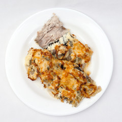 fish baked under cheese