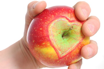 Jabłko w dłoni serce - obrazy, fototapety, plakaty