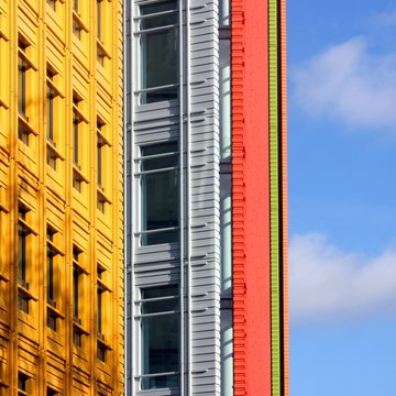 Colourful architecture against a bright blue sky