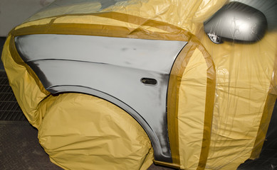 Car fender prepared for painting