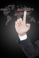 Hand pushing social network world map.