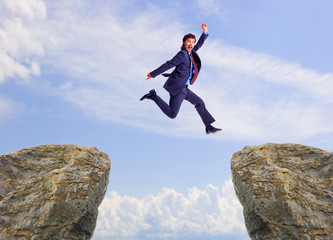 Obraz premium Happy jumping businessman.