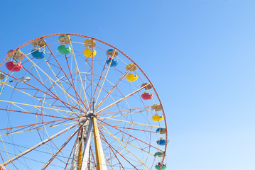 Fototapeta premium Ferris wheel with blue sky