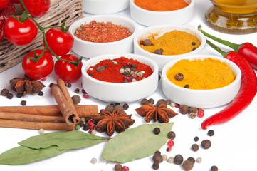 Different spices on a wooden table