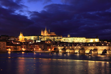 View on Prague gothic Castle with Charles Bridge in the Night