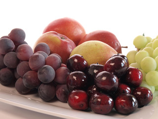 Fresh fruits on white