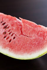 watermelon lying on a wooden table