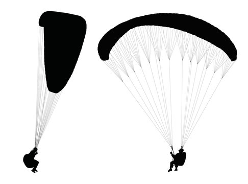 Vector silhouettes of flying paragliders
