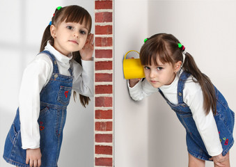 Little twin girls overhears