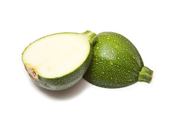 Globe courgette isolated on a white studio background.