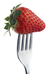 Strawberry on fork