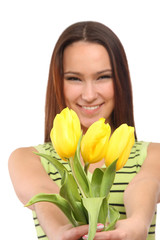 portrait girl with yellow tulips on white